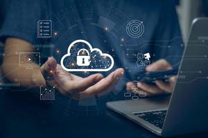 Cloud computing diagram technology Data storage internet networking software concept.Man use laptop computer with cloud on hand virtual screen. photo