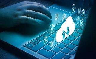 Woman using laptop with VR cloud computing diagram. Cloud technology. Data storage. Networking and internet service concept. photo
