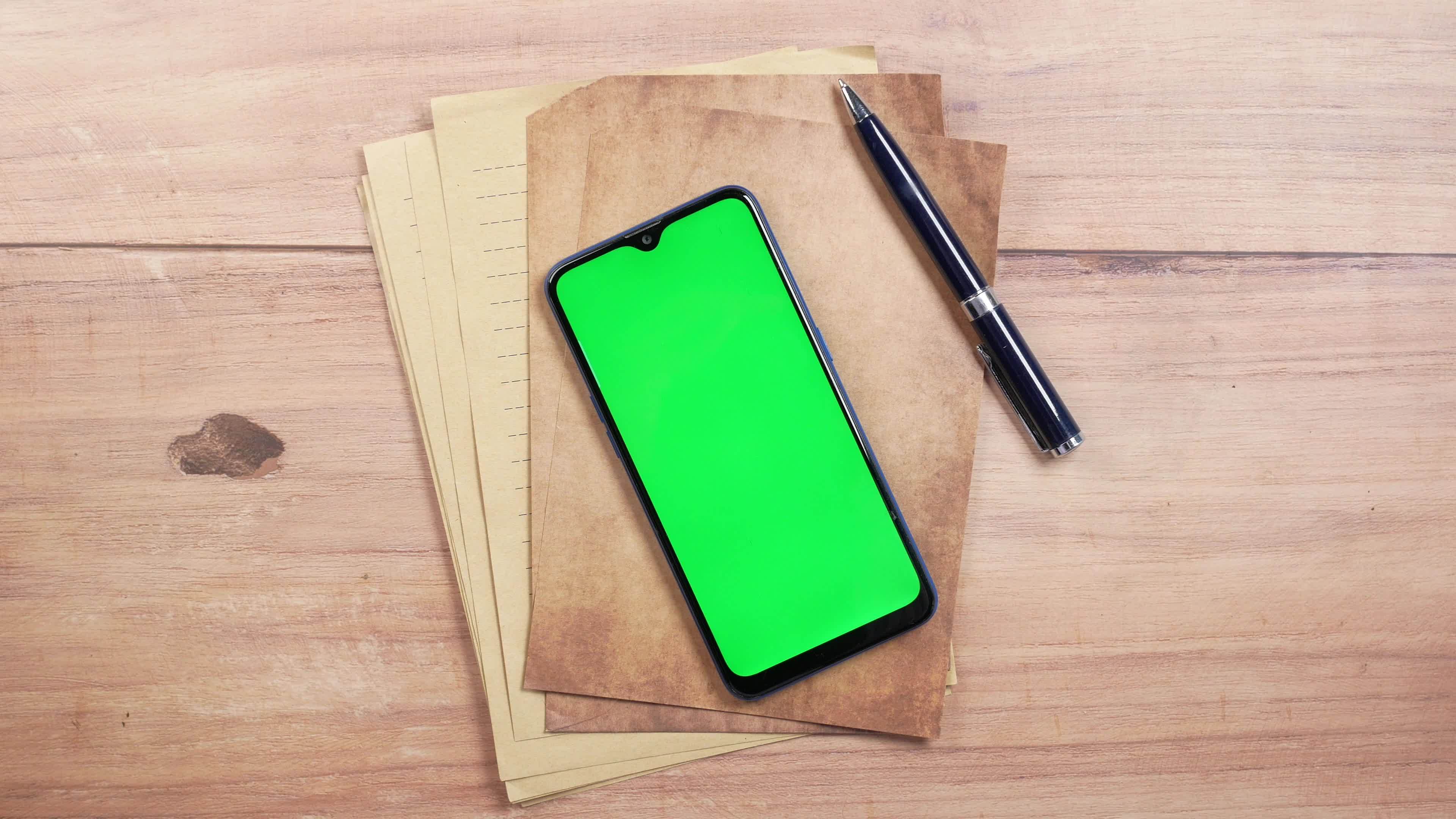 Phone With Green Screen On Brown Parchment And Lined Paper Stationery phone-with-green-screen-on-brown-parchment-and-lined-paper-stationery