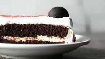 A slice of a delicious chocolate cake, vanilla filling video