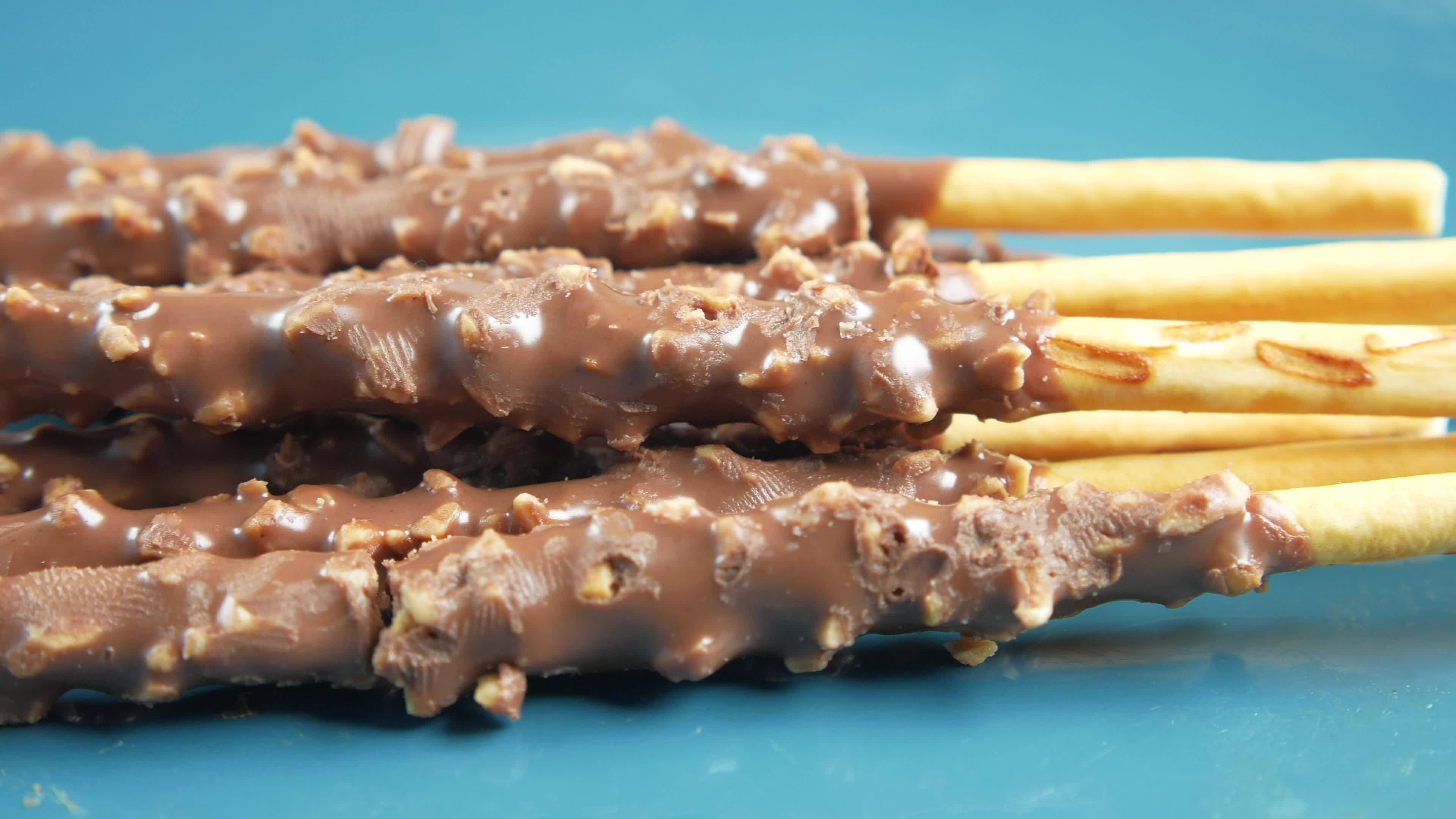 Chocolate covered breadsticks 13785012 Stock Video at Vecteezy