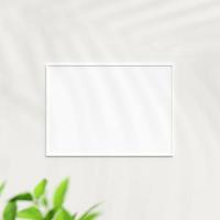 Photo frame mockup on white wall. Poster mockup. Clean, modern, minimal frame. Minimalist background. Blank picture frame mockup. 3d rendering.