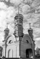 Christian church cross in high steeple tower for prayer photo