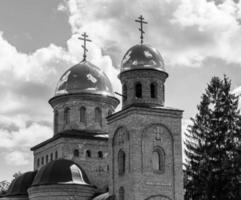 Christian church cross in high steeple tower for prayer photo