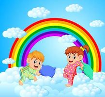 dos niños felices están luchando contra una almohada con un paisaje de arco iris vector