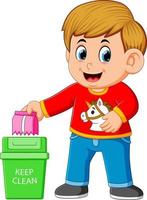 A boy keep clean environment by trash in rubbish bin vector