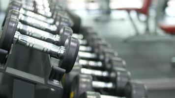 Dumbbells on rack in a gym