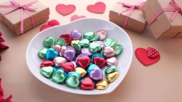 Heart shaped candy and wrapped gifts video