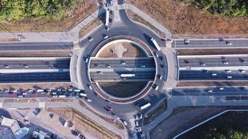 Time-lapse drone footage of road roundabout. video