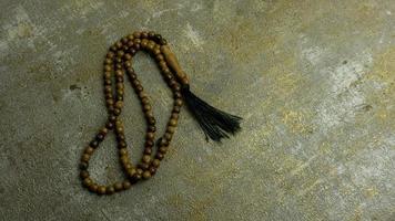 wooden tasbih beads isolated. islamic prayer beads photo