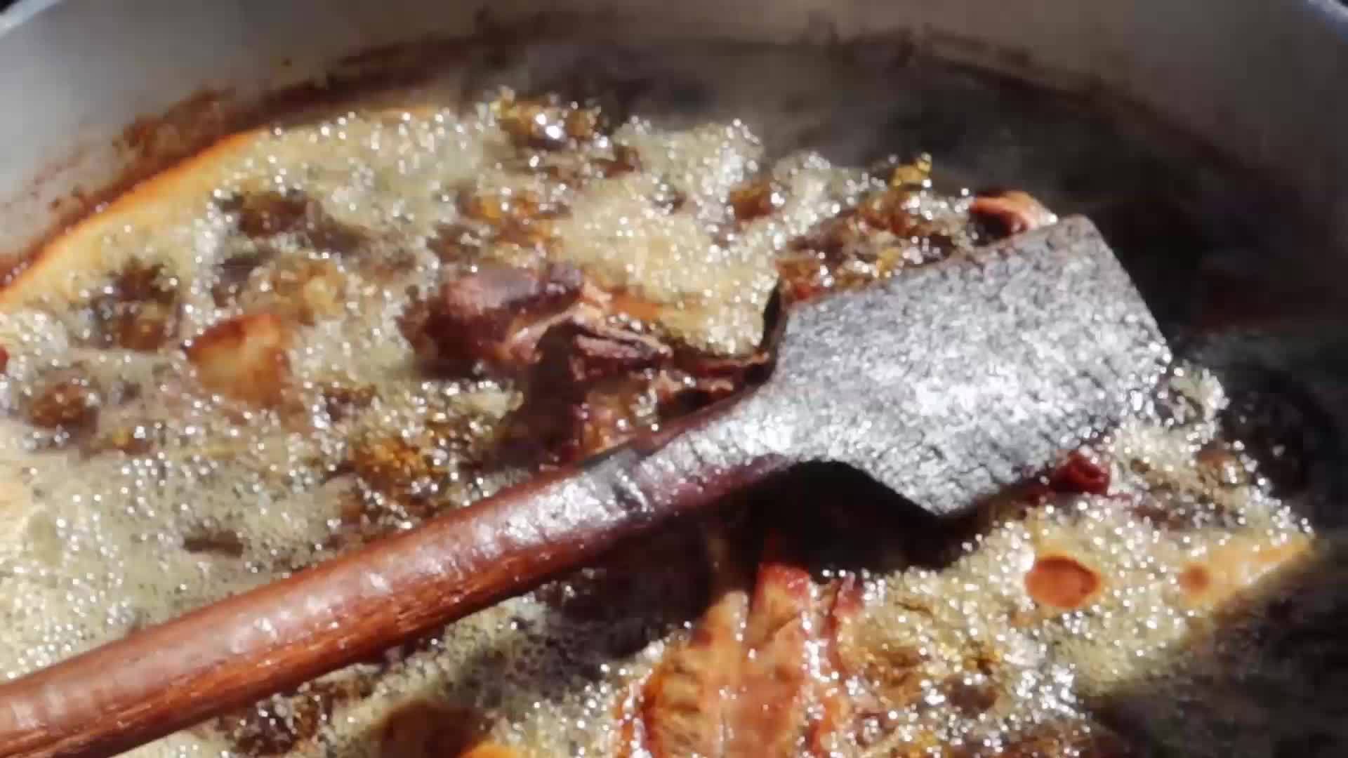 Saucepan with pork carnitas frying in lard in Mexico 13802279 Stock