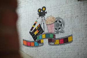 Film and media painting in the wall photo