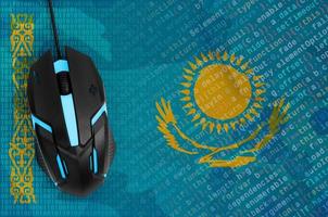 Kazakhstan flag and computer mouse. Digital threat, illegal actions on the Internet photo