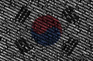 South Korea flag is depicted on the screen with the program code. The concept of modern technology and site development photo