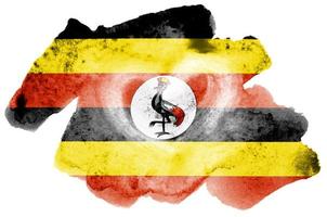 Uganda flag is depicted in liquid watercolor style isolated on white background photo