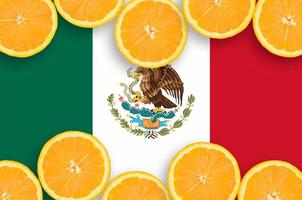 Mexico flag in citrus fruit slices horizontal frame photo