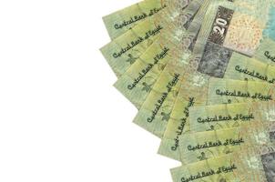 20 Egyptian pounds bills lies isolated on white background with copy space. Rich life conceptual background photo