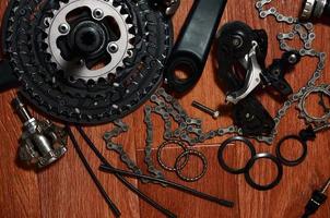 Many different metal parts and components of the running gear of a sports bike photo