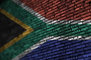 South Africa flag is depicted on the screen with the program code. The concept of modern technology and site development photo