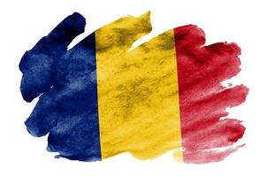 Romania flag is depicted in liquid watercolor style isolated on white background photo