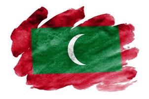 Maldives flag is depicted in liquid watercolor style isolated on white background photo