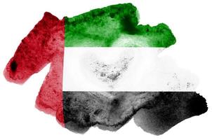 United Arab Emirates flag is depicted in liquid watercolor style isolated on white background photo