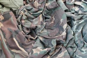 Camouflage background texture as backdrop for stalking and Chernobyl exclusion zone design projects photo