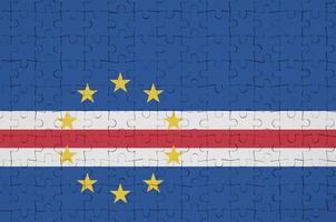 Cabo verde flag is depicted on a folded puzzle photo