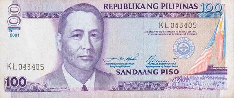 Manuel A Roxas on 100 piso Philippines money bill close up fragment photo