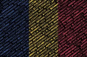 Chad flag is depicted on the screen with the program code. The concept of modern technology and site development photo