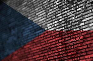Czech flag is depicted on the screen with the program code. The concept of modern technology and site development photo