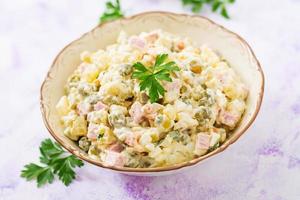 Traditional Russian salad Olivier. New Year salad. Festive salad. photo