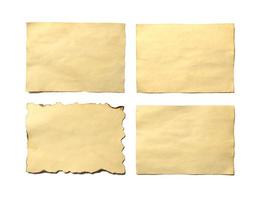 Set of old blank pieces of antique vintage crumbling paper manuscript or parchment photo