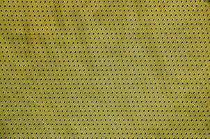 Sport Clothing Fabric Texture Background. Top View of Cloth Textile Surface. Colored Basketball Shirt with Text Space photo