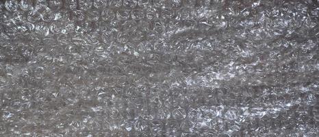 White bubble Wrap Packing Or Air Cushion material. Abstract Texture For Creative Art Work, Close Up dfckground, Top View with Copy Space photo