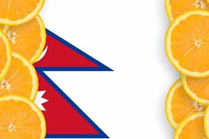 Nepal flag in citrus fruit slices vertical frame photo