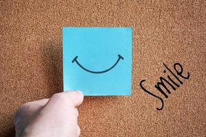 smile on the post it, feelings and emotions photo