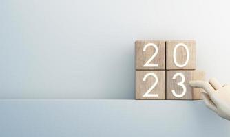 Countdown start new year 2023 with the vision and perspective of planning to achieve goals. concept for the future business and management. in cartoon illustration on red background. 3d rendering photo