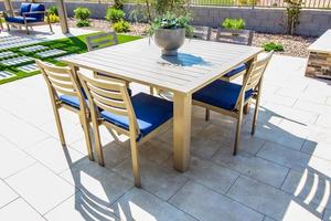 Rear Yard Patio Furniture With Table, Chairs And Couch photo