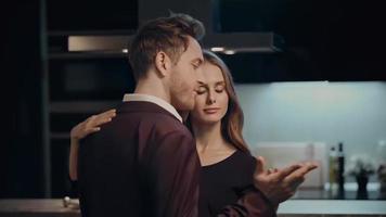 Romantic young couple dancing at home. Romantic young couple meet at home.