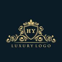 logotipo de la letra hy con escudo dorado de lujo. plantilla de vector de logotipo de elegancia.