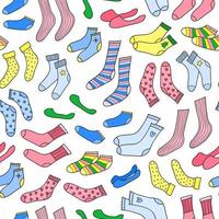 Seamless pattern with doodle socks. vector