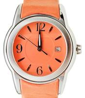 one minute to twelve o'clock on orange wristwatch photo