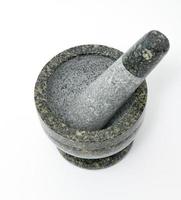 Granite mortar on white background photo