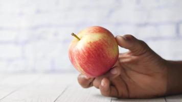 Holding an apple close up video