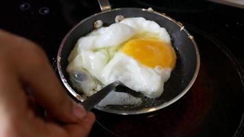 Frying egg in a tiny skillet video