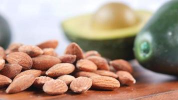 Avocado and almonds close up video