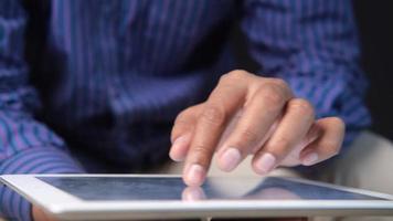 Man uses tablet touch screen video
