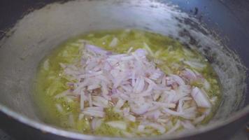 Diced onions simmering in hot butter video