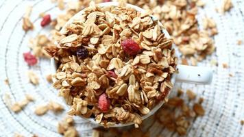 Overhead view of oat granola with dried fruit video